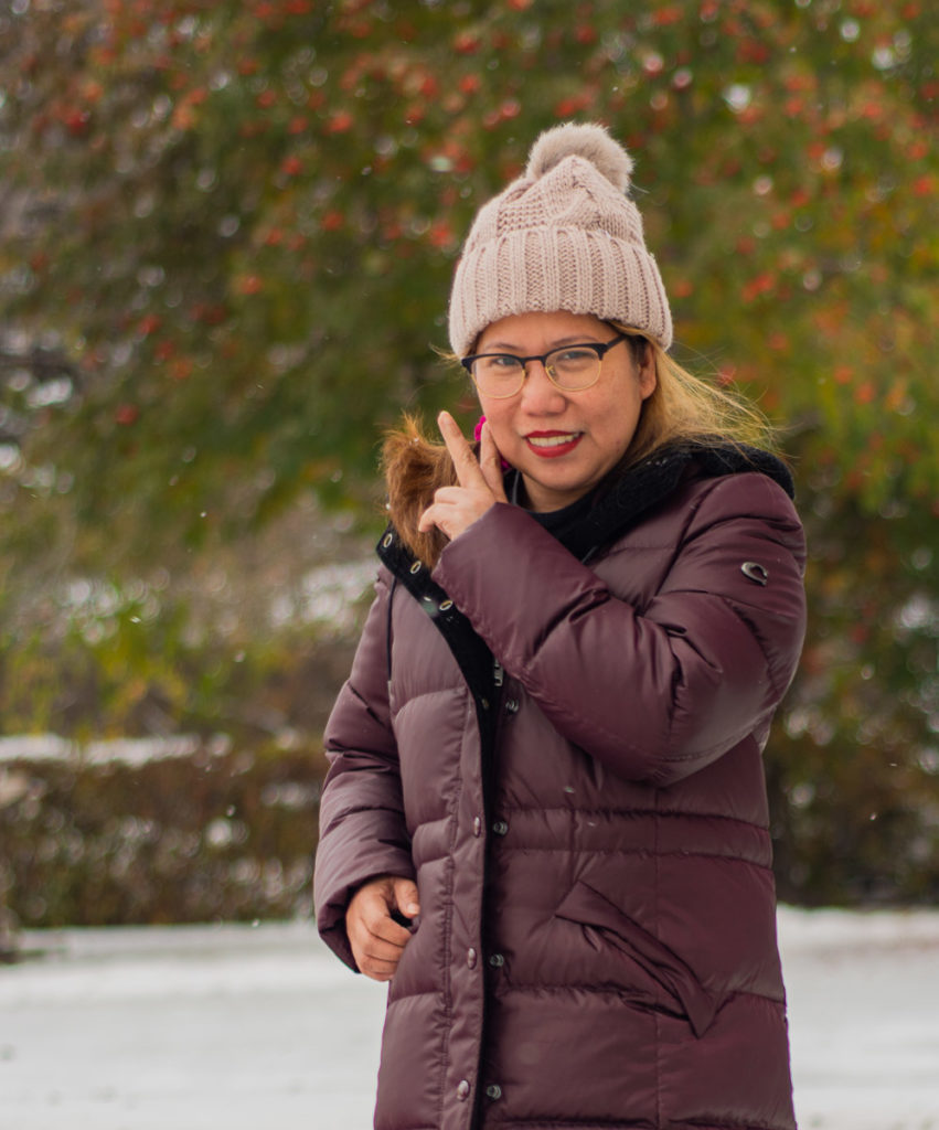 fall season outdoor photo session at olds alberta on a snowy fall day